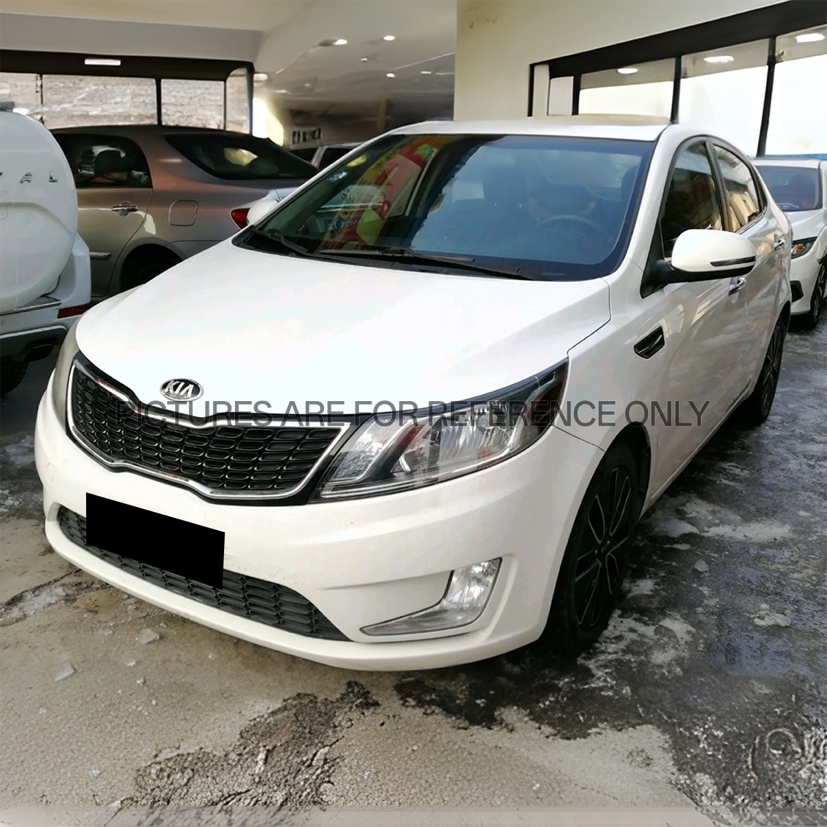 Kia K2 Automatic Luxury, White Registration Date: May 14, 2013